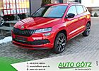 Skoda Karoq Sportline DSG AHK-Vorb.*Navi*DAB*VZE*LED*ACC*SmartLink*DigiCockpit*elektr. Heckkl.*Kamera*ParkAssist*Kessy*BlindSpot*Freispr.*Sitzheiz*PDC*vo+hi*Alu*LichtAssist*SpurAssist*Connect*Sunset*ZV-Funk*4xEFH*Ladeboden*beheiz.Frontscheibe*Nebel*Armlehne*Metallic