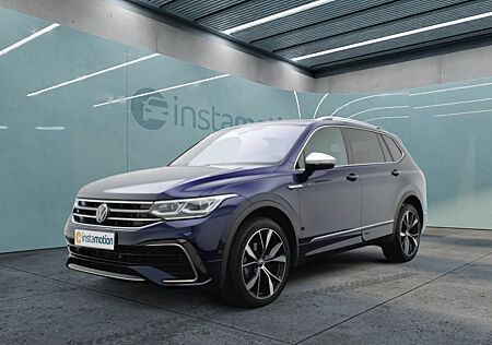 VW Tiguan Allspace 2.0 TDI DSG 4Mo. R-Line 7-S. NAVI-PRO PANORAMA HUD AHK 20 HK-SOUND DCC ACC KAMERA PARKLENK PDC SHZ