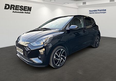 Hyundai i10 Prime+Sitz-&Lenkradheizung+Navi+Rückfahrkamera+Allwetterreifen+Induktionsladen