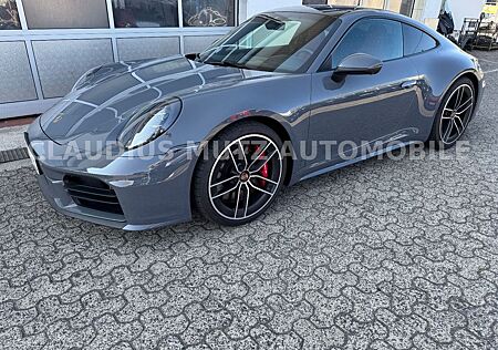 Porsche 992 .2 S Coupé ° schiefer grau/rot ° SPORT DESIGN