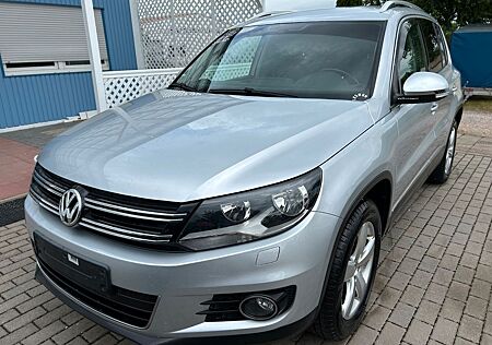 VW Tiguan Volkswagen 1.4 TSI Sport & Style Klima AHK Navi Lede