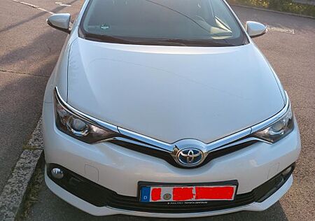 Toyota Auris 1,8 Kombi Hybrid Benzin weiß