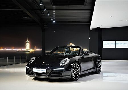 Porsche 991 Cabrio*SPORTABGAS*20"LM*PCM*SOUND-PACK.*1-HD