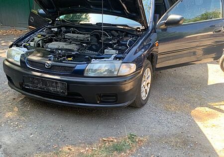 Mazda 323 C 1.4 -