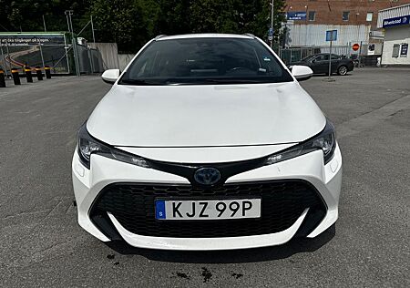 Toyota Corolla 1,8 Hybrid Comfort Touring Sports Co...