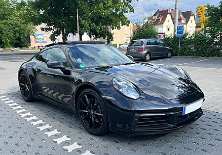 Porsche 992 Carrera Coupé Carrera / BOSE / Pano / black