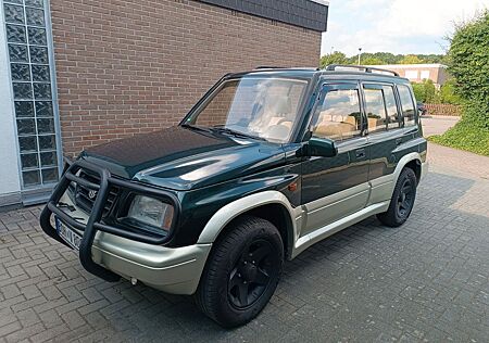 Suzuki Vitara 2.0 V6 Allrad 4x4 ET 1997 Lada niva