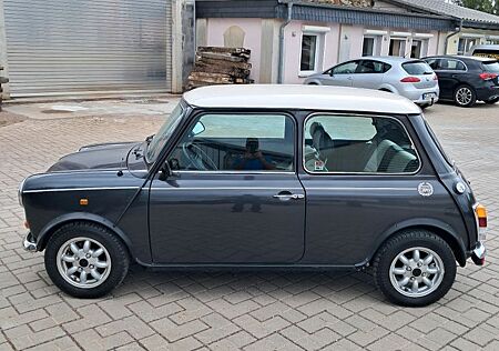 Mini Cooper SPI 1,3 metallic blau
