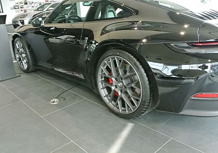 Porsche 992 .2 coupe s, mod 25, schw/schw,abgas,bose,21",