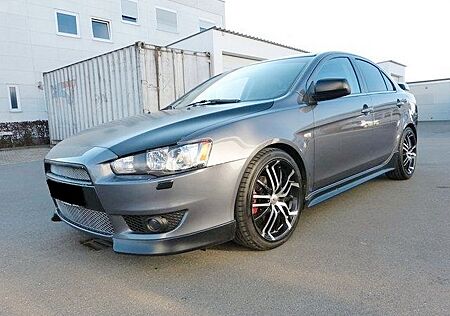 Mitsubishi Lancer 2.0 Evo Optik ·BI-Xenon·Navi·Leder·SHZ·Ka