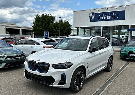 BMW iX3 IMPRESSIVE AHK Shadow Line HeadUp H&K