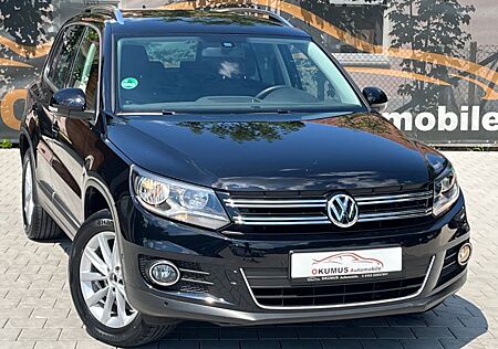 VW Tiguan Volkswagen Sport & Style BMT 1.HAND*AHK*NAVI*TÜV NEU