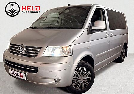 VW T5 Transporter Volkswagen Caravelle*1HAND*9SITZER*MOTORNEU