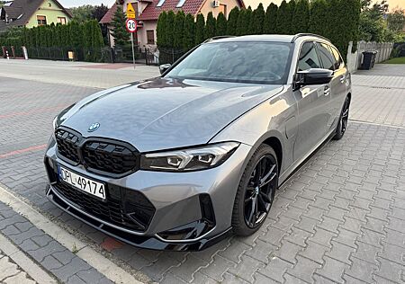 BMW 320e Touring Auto -