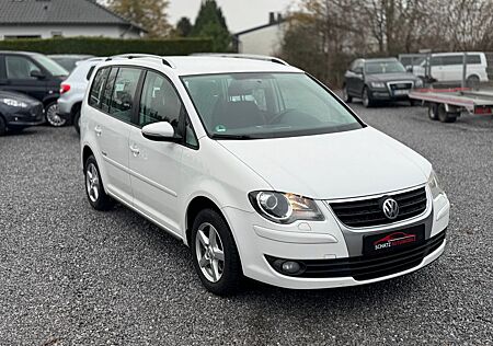 VW Touran Volkswagen Freestyle 7Sitze/PDC/Navi/AHK/Garantie