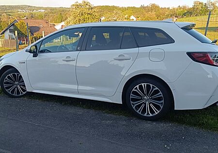 Toyota Corolla 2,0 Hybrid Team De Garantie bis 2036
