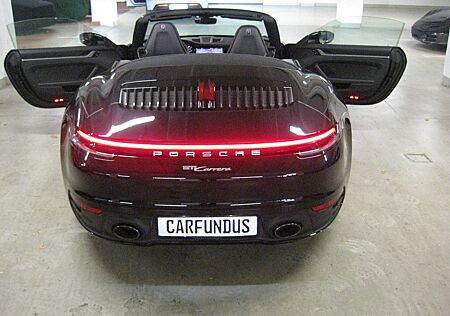 Porsche 992 cabrio,schw/schw,abgas,21",bose,pdk,kam,gara