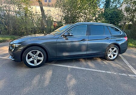 BMW 320i Touring -