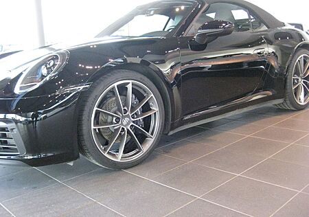 Porsche 992 cab,schw/schw,pdk,abgas,21",kamera
