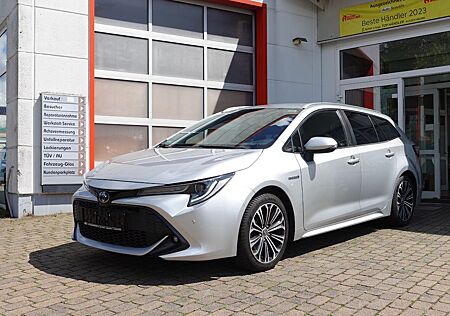 Toyota Corolla 1,8 Hybrid Touring Team D Uber Bolt