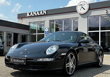 Porsche 997 CARRERA COUPE *-SCHECKHEFT*