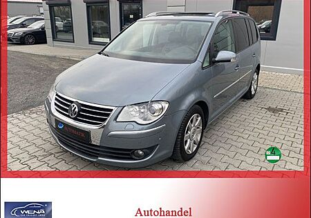 VW Touran Volkswagen 1.4 TSI DSG*NAVI*XENON*PANORAMA*7/SITZE*