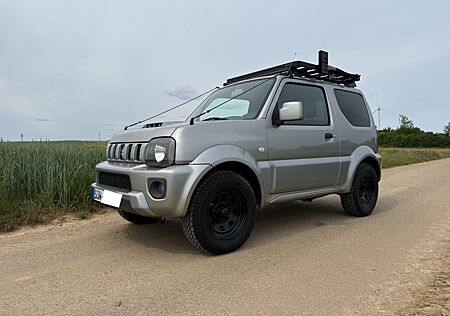 Suzuki Jimny 1.3 4WD Style Ranger mit Dachträger