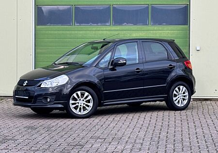Suzuki SX4 City+ 1.6 Club/Navi./Alu/Klimaaut./SHZG