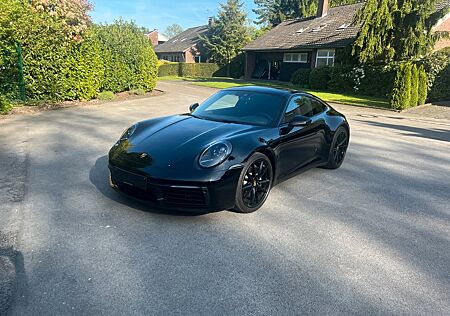 Porsche 992 Carrera Coupé wie NEU !!!