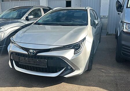 Toyota Corolla gebraucht kaufen Toyota Corolla 1,8 Hybrid Team Deutschl Touring Spo...