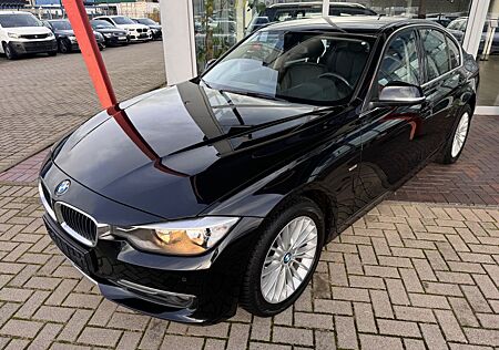 BMW 320i 3 Lim. Luxury*Navi*Leder*PDC*Sitzhzg*Automt