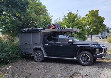 Mitsubishi L200 mit Crawler Camping Aufbau