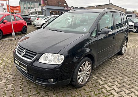 VW Touran Volkswagen 2.0 TDI Highline*Xenon/PDC/Navi/7-Sitze*