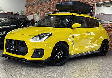 Suzuki Swift Sport-Navi-Kamera-LED- Alu17"-Dachbox-H&R