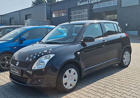 Suzuki Swift Lim. Club/2.Ha/TüvNeu/Klima/5.Tür/ZV/