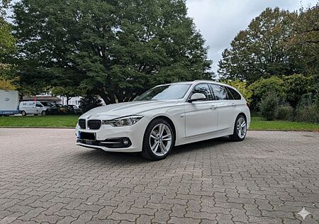 BMW 320i Touring Sport Line | weiß | 8-fach bereift