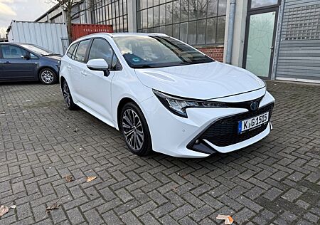 Toyota Corolla 1,8 Hybrid Touri Sports Scheckheft Garan