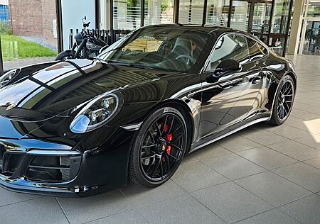 Porsche 991 CARRERA GTS SCHECKHEFT