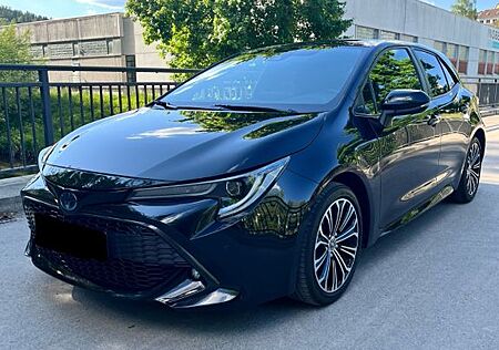 Toyota Corolla 2,0 Hybrid Team Deutschland/ Garantie