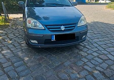 Suzuki Liana Zuverlässiger 1.6 Benziner, Erstzul