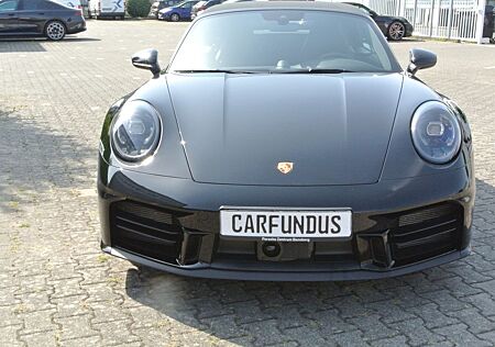 Porsche 992 s cab,schw/schw,sport des,21",ACC,bose,chron