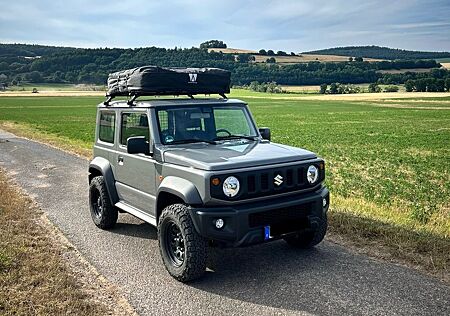 Suzuki Jimny HJ + AHK + 54 mm Spurverbreiterung