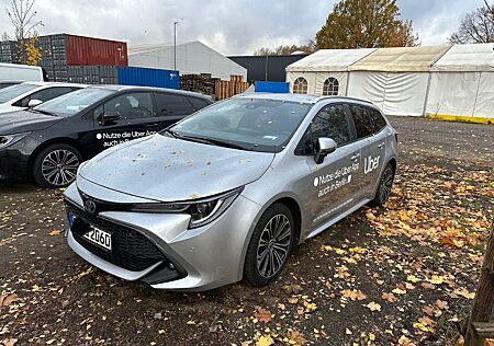 Toyota Corolla 1,8 Hybrid Team Deu. mit Mietwagenpaket