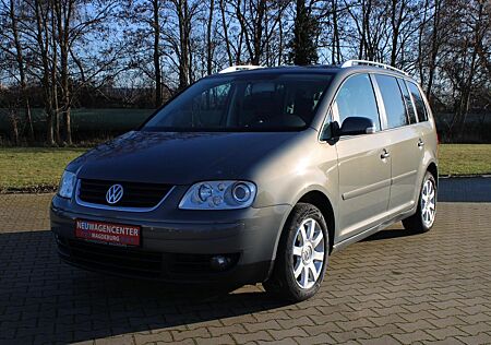 VW Touran Volkswagen 2.0 TDI DSG*7-SITZER*AHK*SHZ*PDC*KLIMAAUT