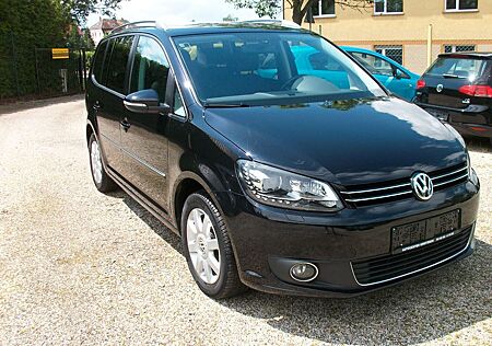 VW Touran Volkswagen Highl. 7 Sitze,Navi,Alcant.Bi Xenon,Klima