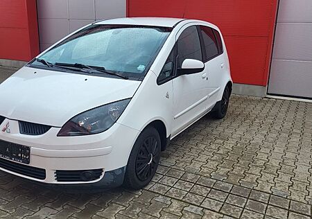 Mitsubishi Colt gebraucht kaufen Mitsubishi Colt 1.3 KLIMA/5-TÜREN/SCHECKHEFT/1 HAND
