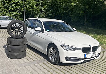 BMW 318d Touring Sport Line mit zwei Sätzen Alufelge