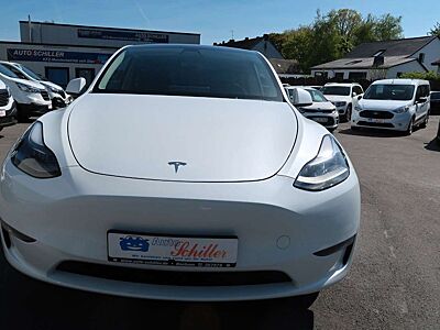 Tesla Model Y Basis RWD # aus 1 - Hand
