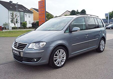 VW Touran Volkswagen 2.0 TDI DSG Highline 7-Sitz+AHK+Navi+Xeno