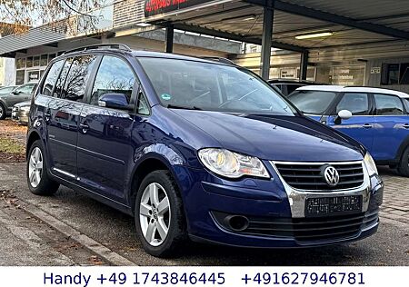 VW Touran Volkswagen 1.6i United/7-Sitzer/NAVI/SHZ/S-Heft/TÜV